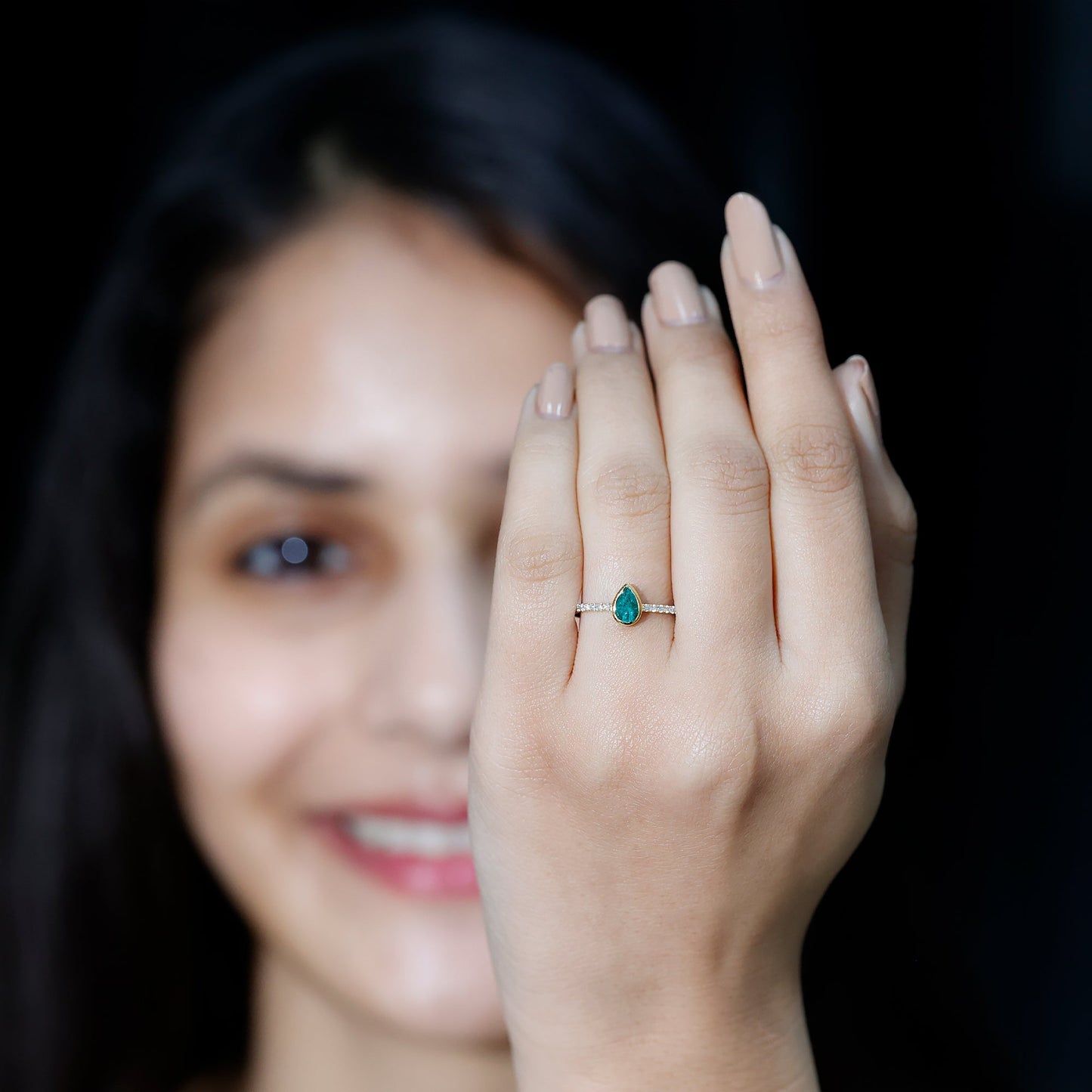 Pear Shaped Emerald Engagement Ring with Diamond Side Stones