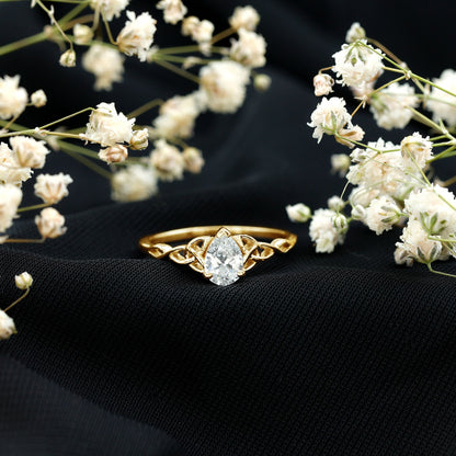 Pear Cut 0.79 Carat Moissanite Celtic Engagement Ring