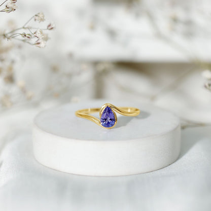 Natural Tanzanite Solitaire Engagement Ring with Bypass Shank