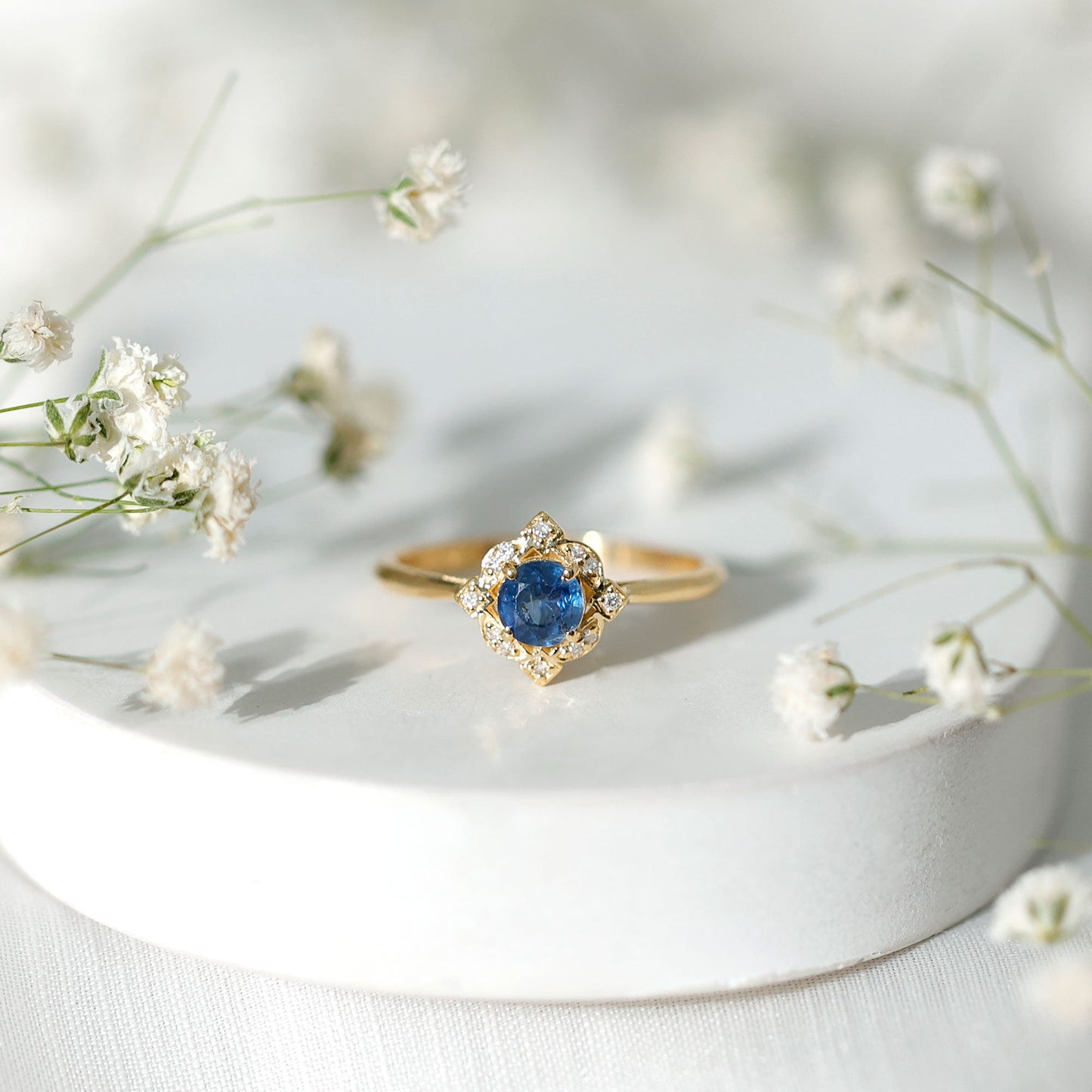 Vintage Style 0.9 Carat Blue Sapphire Engagement Ring with Diamond Halo