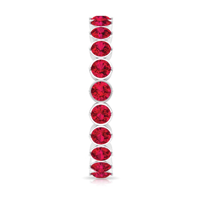 Round Lab Created Ruby Full Eternity Ring in Prong Setting