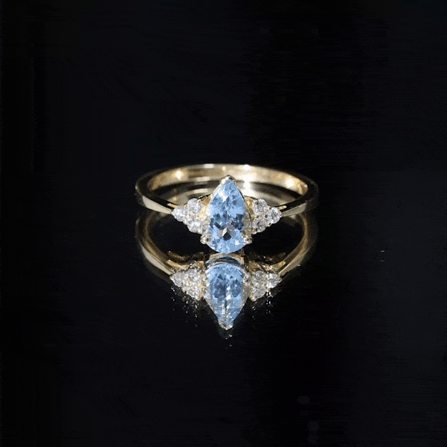 1 Carat Aquamarine Pear Engagement Ring with Diamond Trio