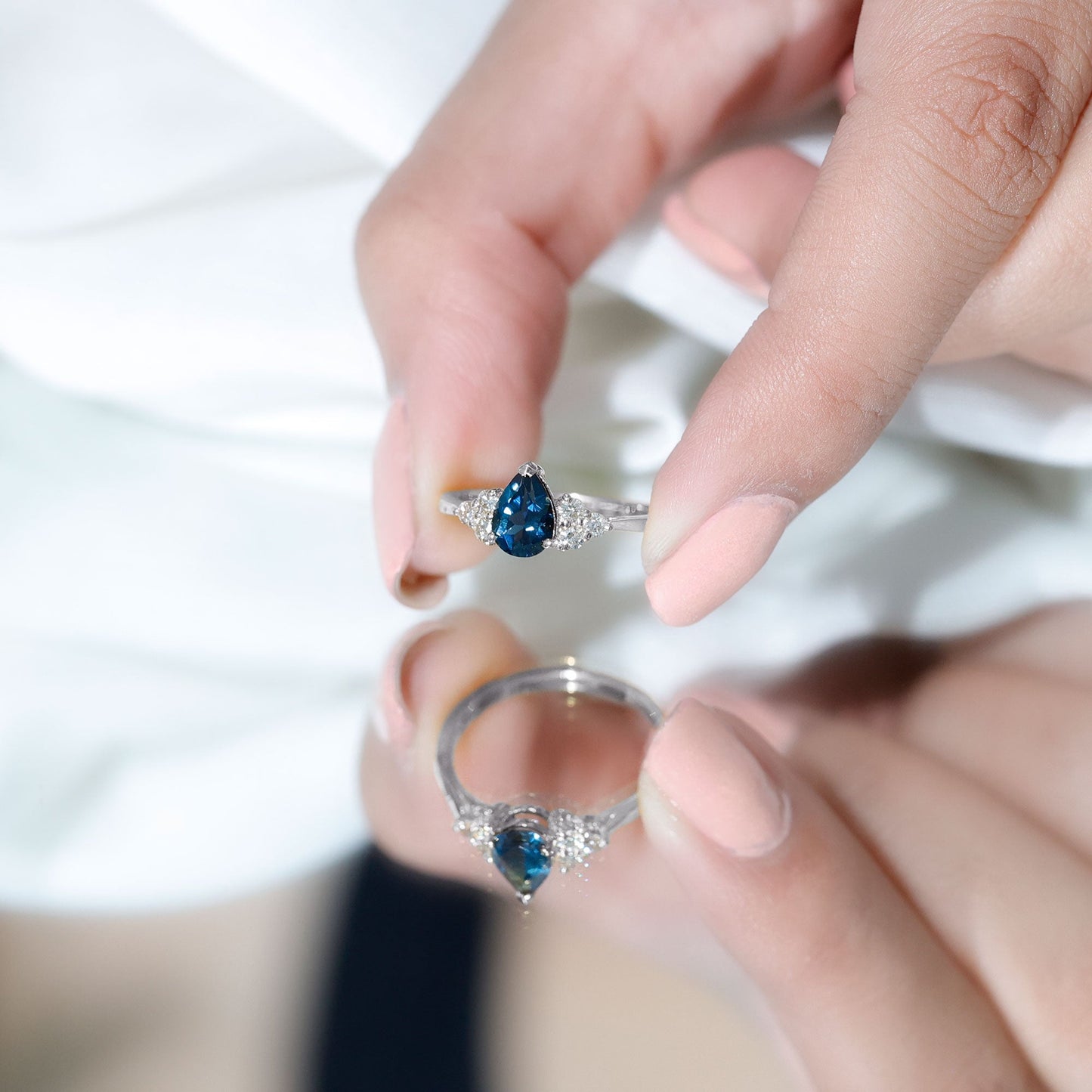 5X7mm Pear Shape London Blue Topaz Engagement Ring with Diamond Trio