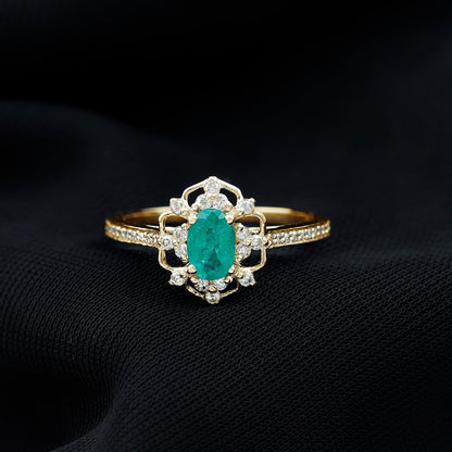 Vintage Style Emerald and Diamond Oval Engagement Ring