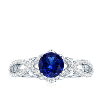 1 Carat Lab Grown Blue Sapphire Engagement Ring with Diamond Crossover Shank