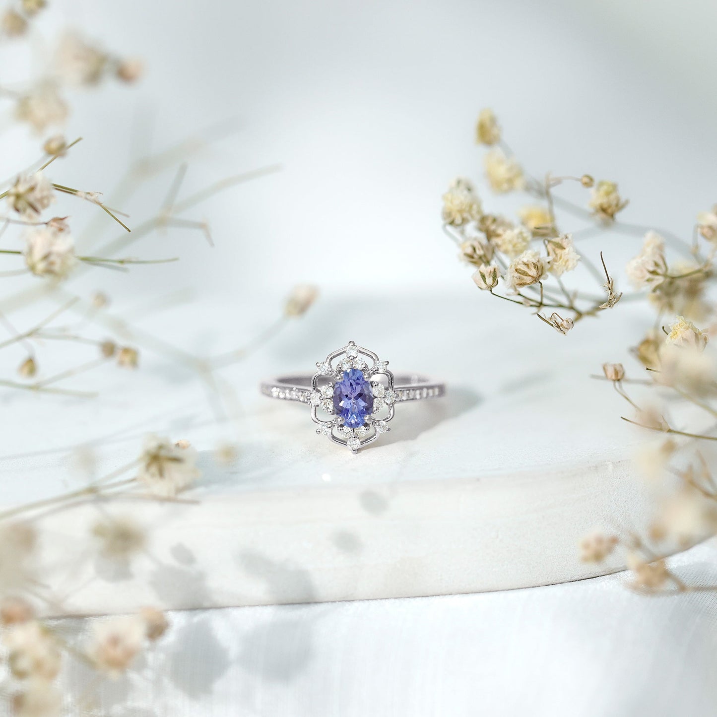 Vintage Looking Tanzanite and Diamond Oval Engagement Ring