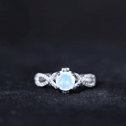 Ethiopian Opal and Diamond Engagement Ring with Crossover Shank