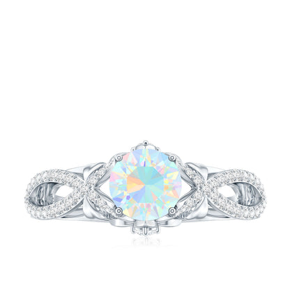 Ethiopian Opal and Diamond Engagement Ring with Crossover Shank