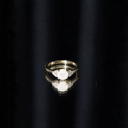 Natural Ethiopian Opal Engagement Ring with Diamond Trio