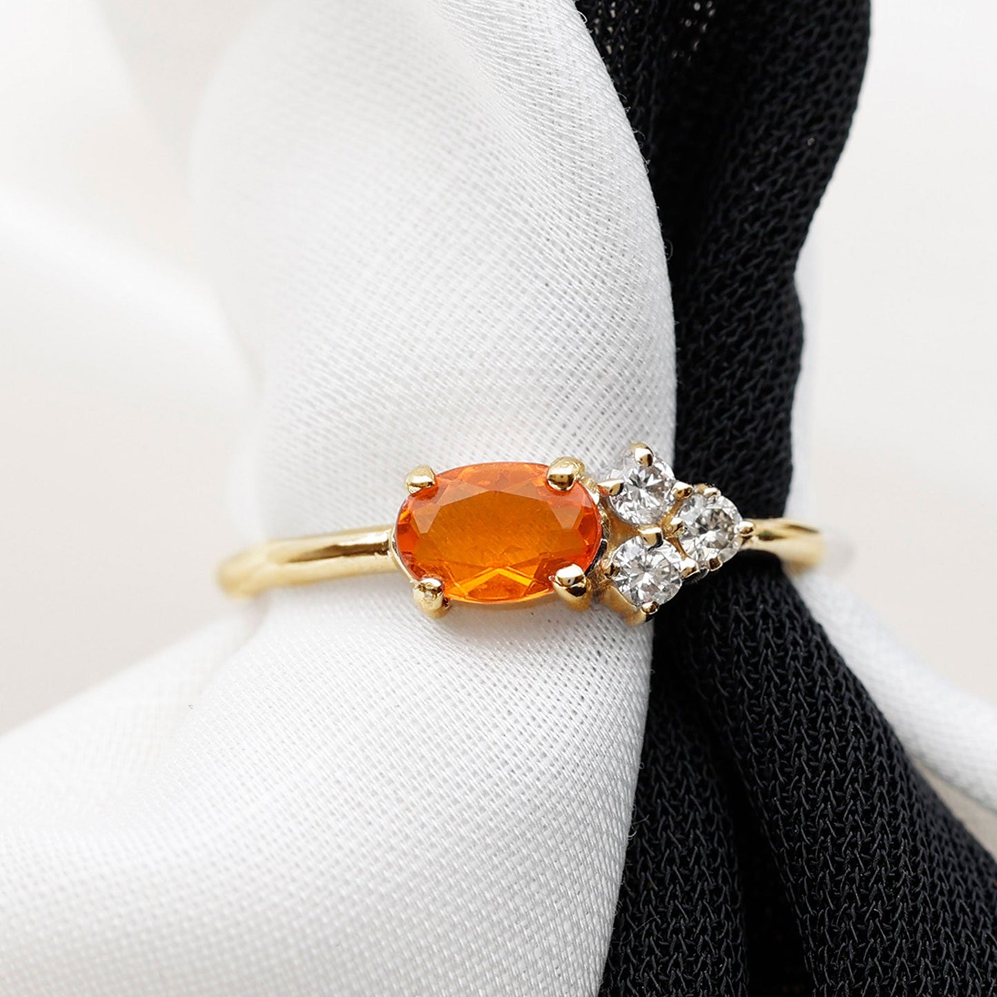 Oval Cut Fire Opal Promise Ring with Diamond Trio