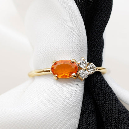 Oval Cut Fire Opal Promise Ring with Diamond Trio