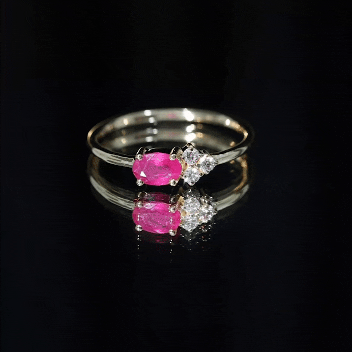 East West Style 0.6 Carat Oval Ruby Promise Ring with Diamond Trio