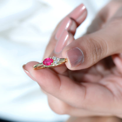 East West Style 0.6 Carat Oval Ruby Promise Ring with Diamond Trio