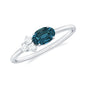 0.4 Carat Oval Cut London Blue Topaz East West Promise Ring with Diamond Trio
