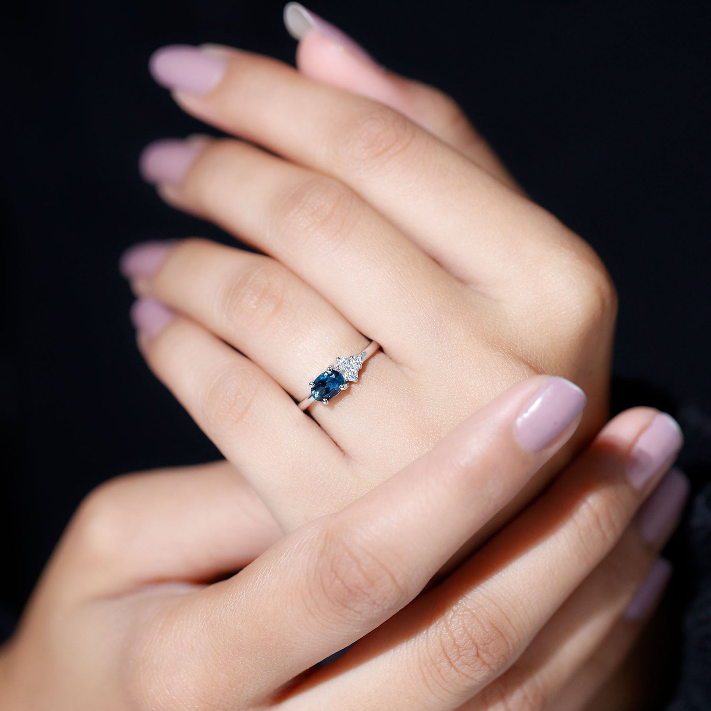 0.4 Carat Oval Cut London Blue Topaz East West Promise Ring with Diamond Trio