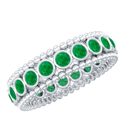 Vintage Inspired Emerald Wedding Band in Bezel Setting