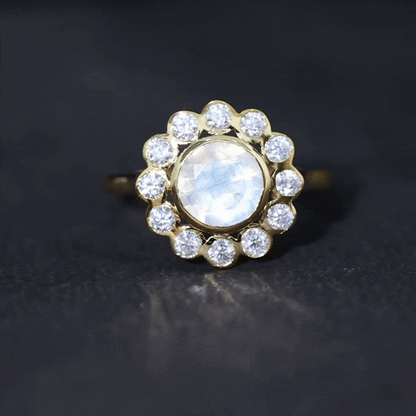 Round Moonstone and Diamond Halo Engagement Ring in Bezel Setting