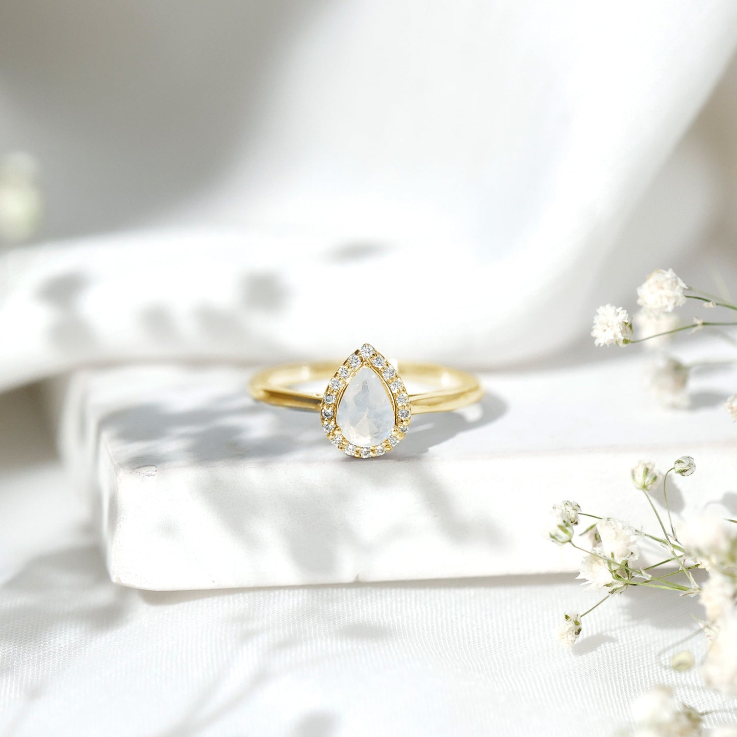 Pear Shaped Moonstone Halo Engagement Ring with Diamond