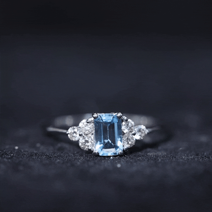 Aquamarine Emerald Cut Engagement Ring with Diamond Trio