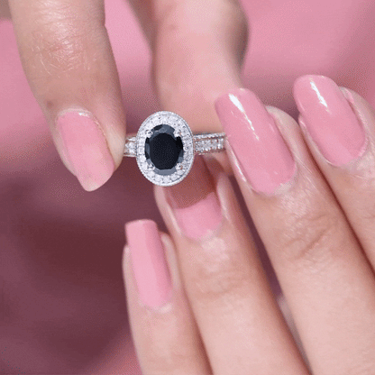 Vintage Inspired Black Onyx Oval Engagement Ring with Diamond Halo