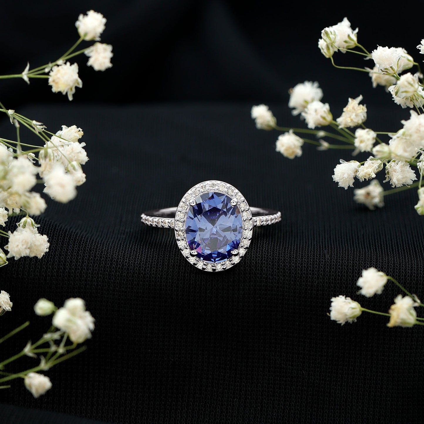 4 Carat Lab Grown Blue Sapphire Oval Engagement Ring with Diamond Halo