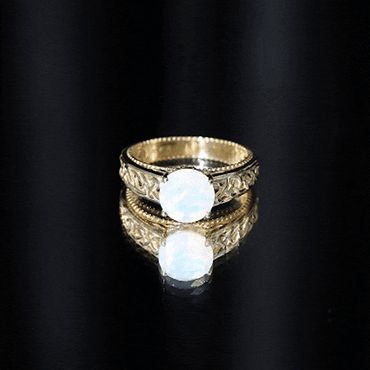 Ethiopian Opal Celtic Knot Engagement Ring with Surprise Diamond