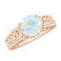 Ethiopian Opal Celtic Knot Engagement Ring with Surprise Diamond