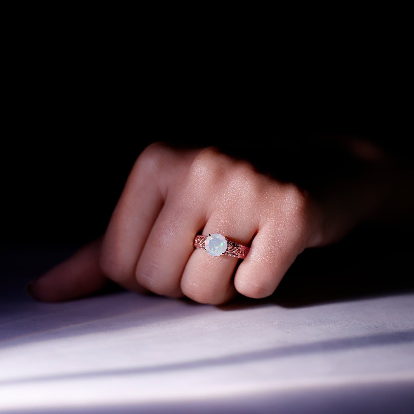 Ethiopian Opal Celtic Knot Engagement Ring with Surprise Diamond