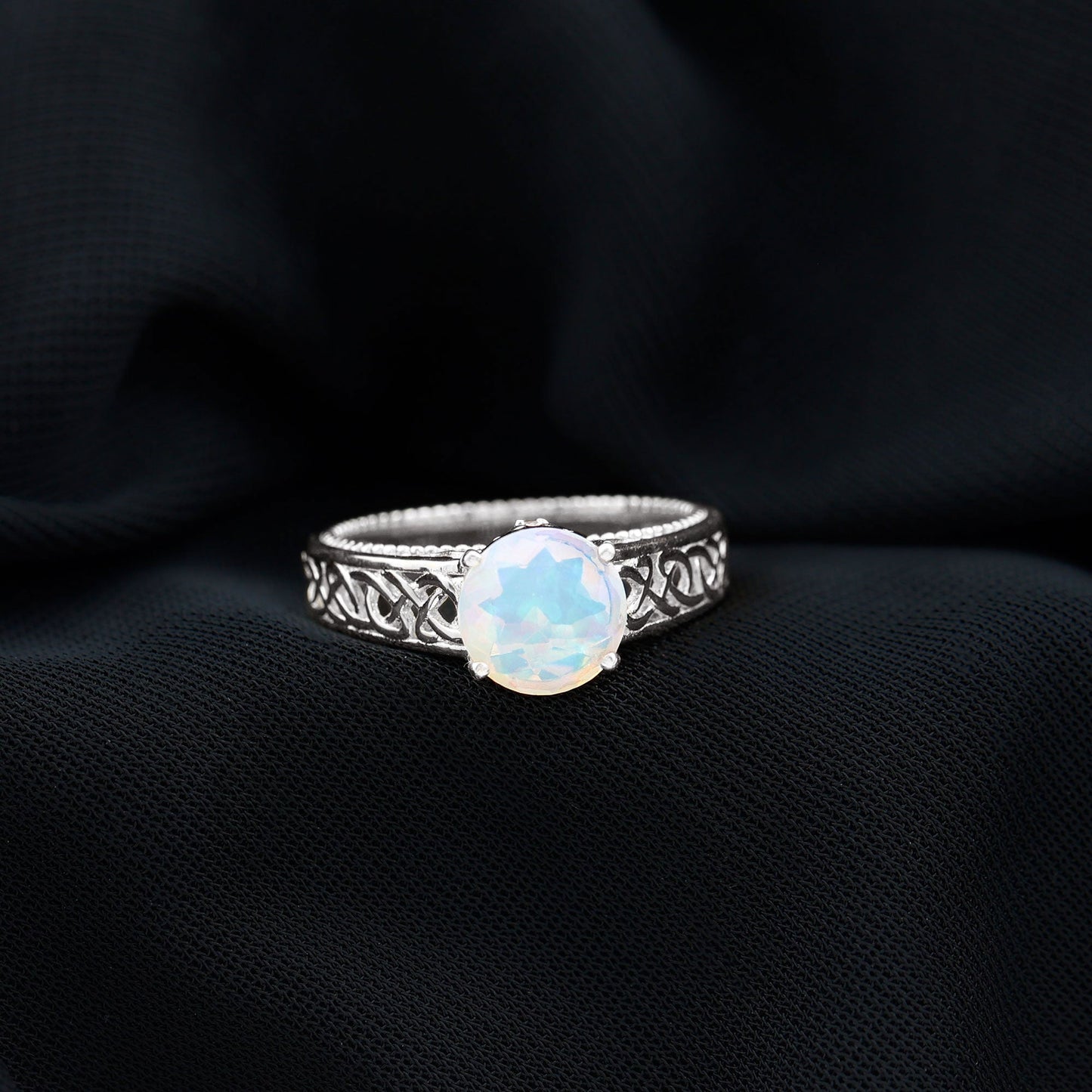 Ethiopian Opal Celtic Knot Engagement Ring with Surprise Diamond