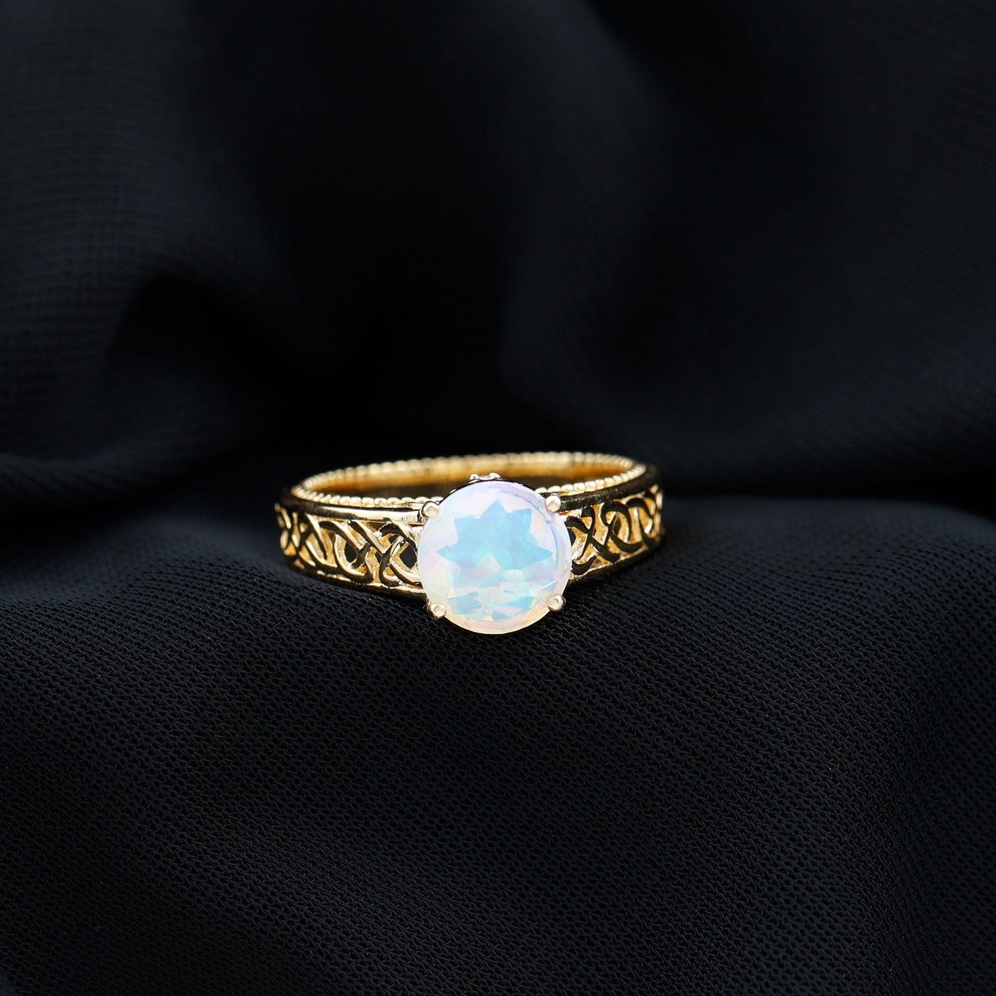 Ethiopian Opal Celtic Knot Engagement Ring with Surprise Diamond