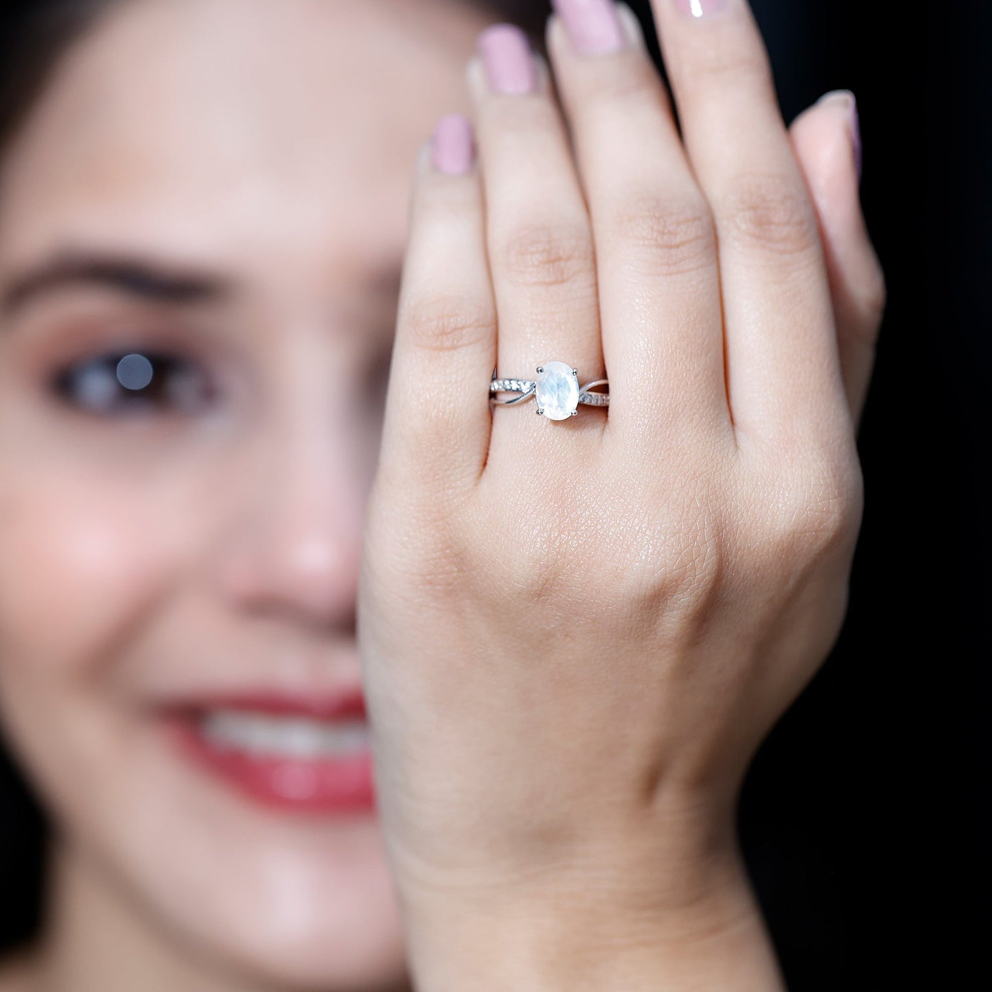 Oval Moonstone Infinity Engagement Ring with Diamond