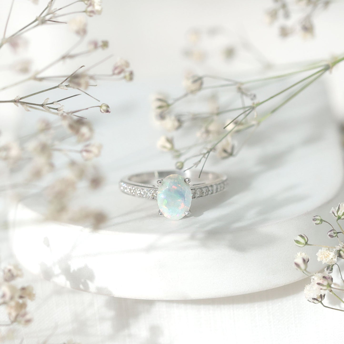 Natural 1.2 Carat Ethiopian Opal Oval Engagement Ring with Diamond Side Stones