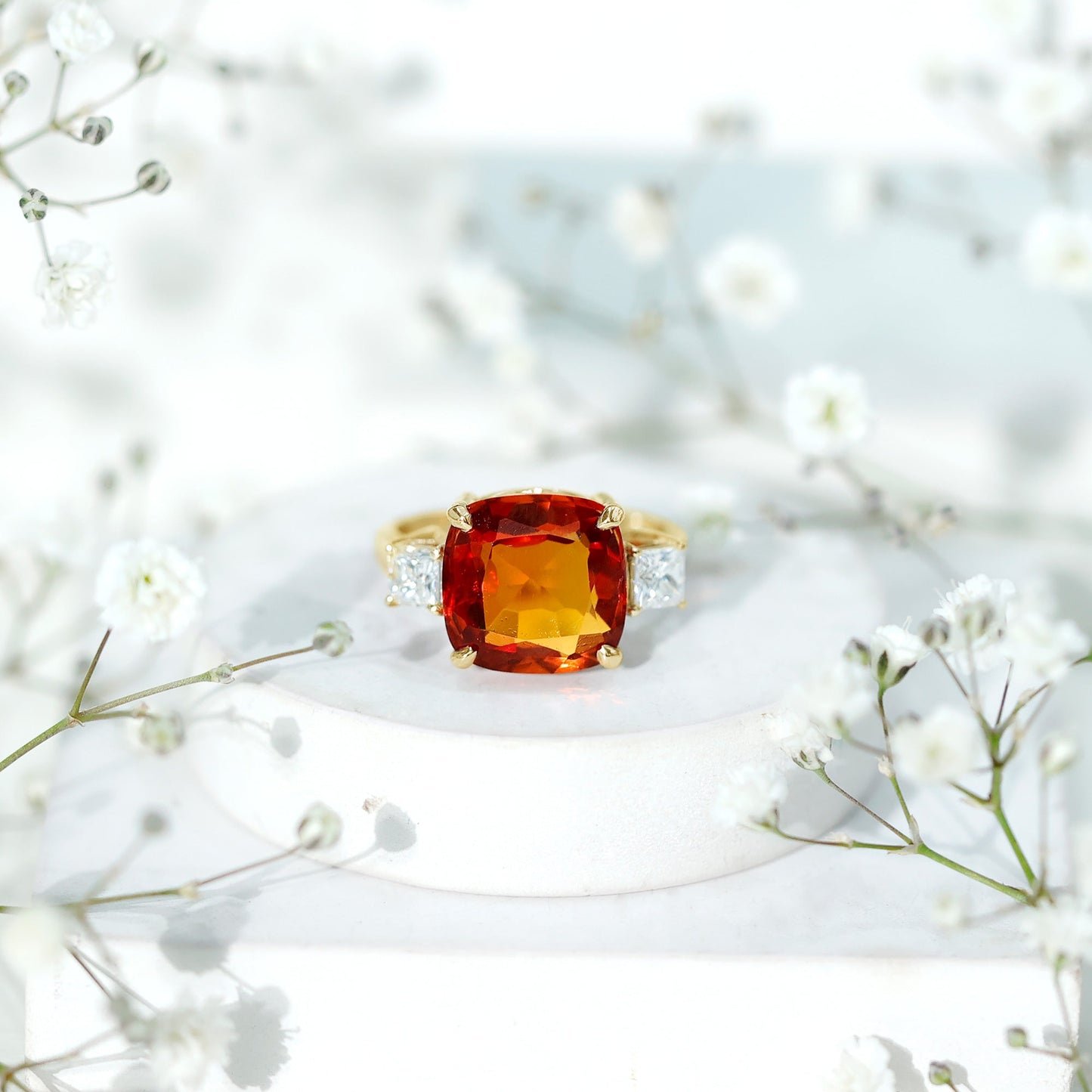 9 Carat Cushion Cut Lab Grown Orange Sapphire 3 Stone Engagement Ring