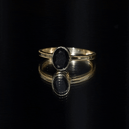 Simple Oval Cut Black Onyx Solitaire Ring in Bezel Setting