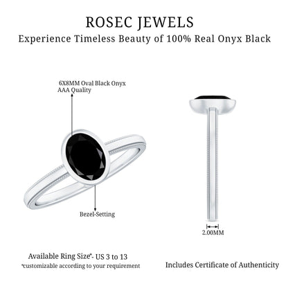 Simple Oval Cut Black Onyx Solitaire Ring in Bezel Setting