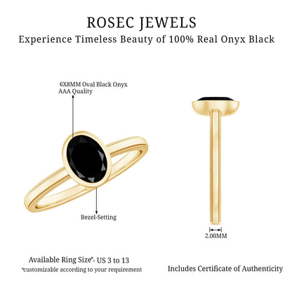 Simple Oval Cut Black Onyx Solitaire Ring in Bezel Setting