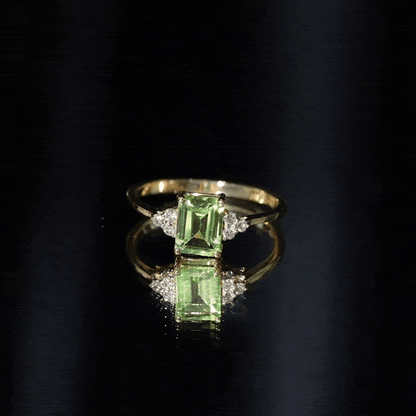 Emerald Cut Peridot Engagement Ring with Diamond Trio