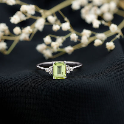 Emerald Cut Peridot Engagement Ring with Diamond Trio