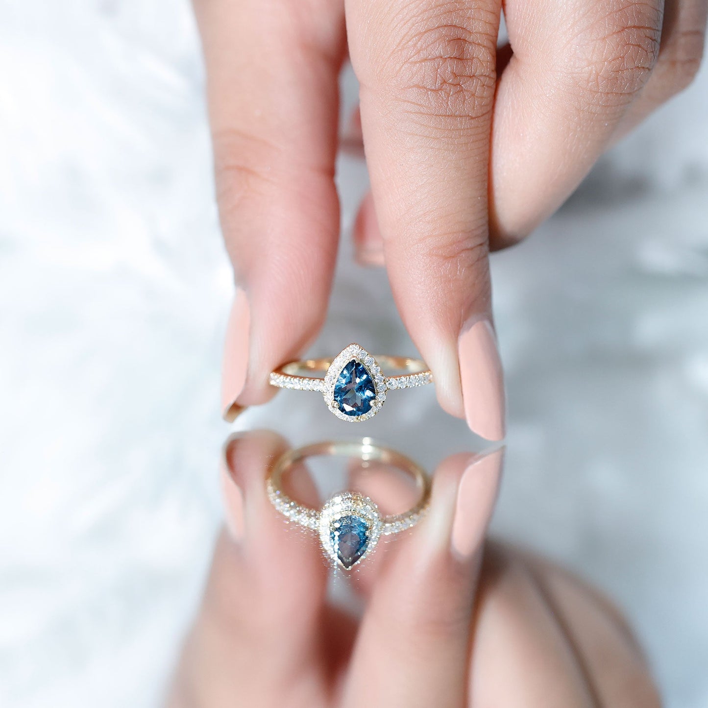 0.7 Carat Pear Shape London Blue Topaz Teardrop Engagement Ring with Moissanite Halo