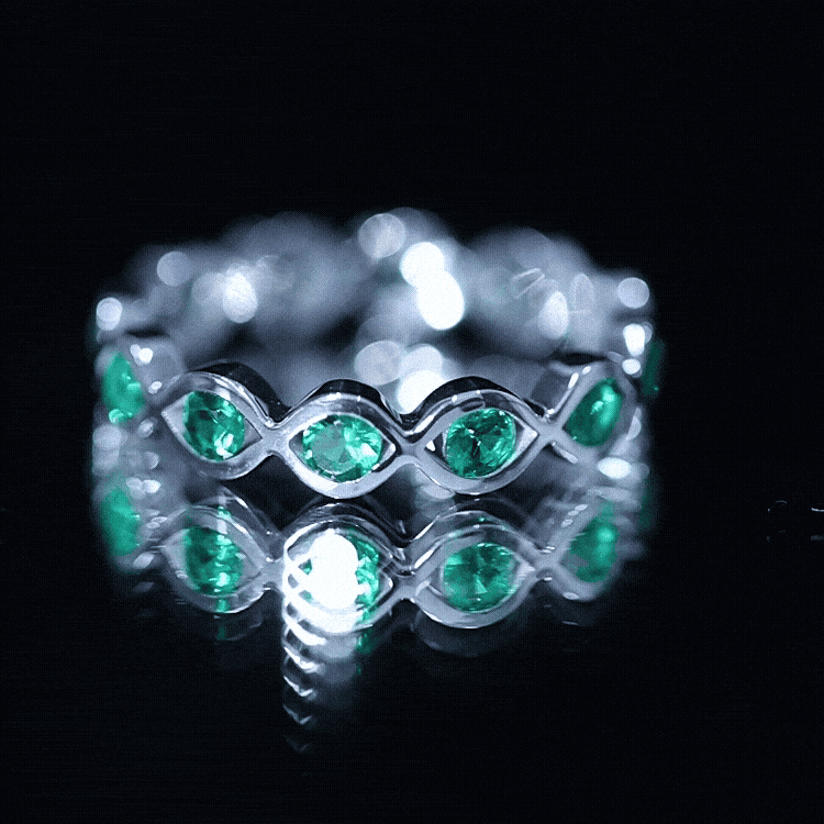 Certified Lab Grown Emerald Infinity Twisted Eternity Ring