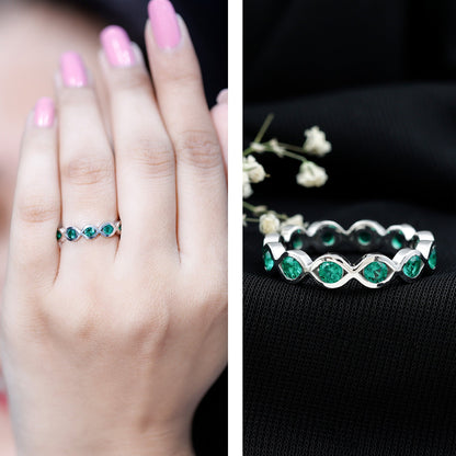 Certified Lab Grown Emerald Infinity Twisted Eternity Ring