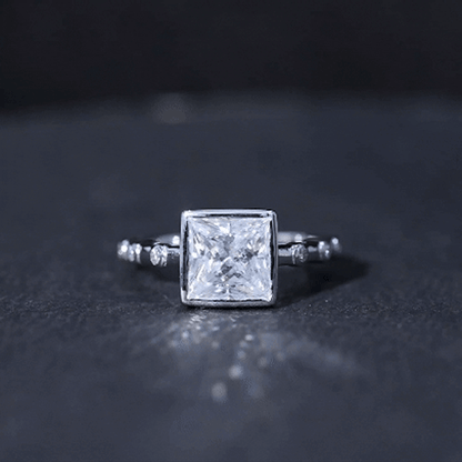 Bezel Set Moissanite Princess Cut Engagement Ring with Spaced Accent