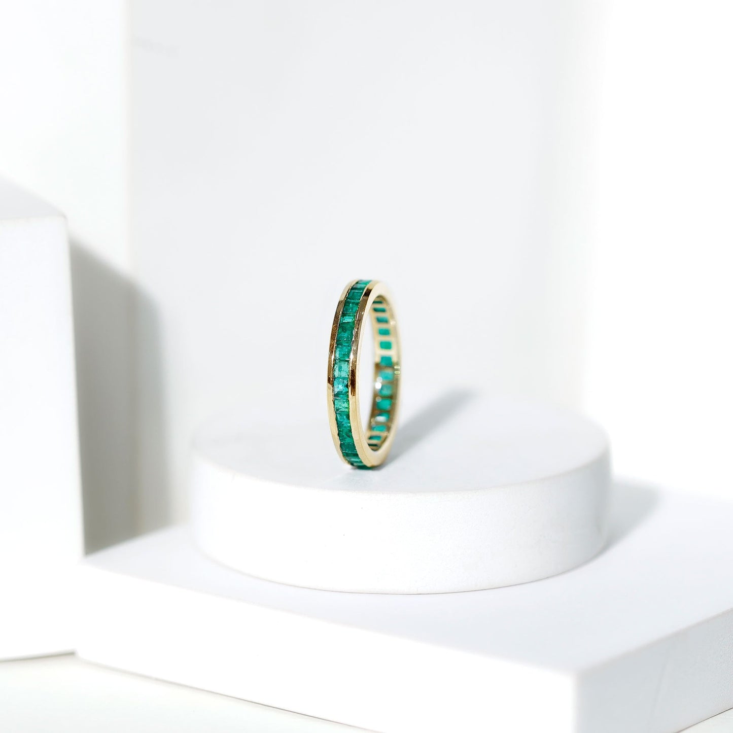 Channel Set Princess Cut Emerald Eternity Band Ring