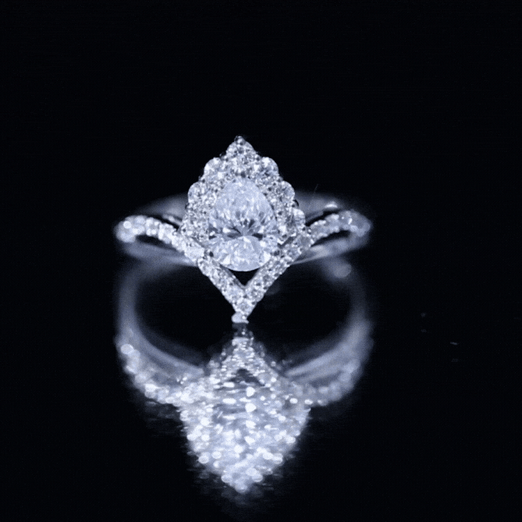 Women's Pear Shaped Moissanite Designer Engagement Ring in Silver
