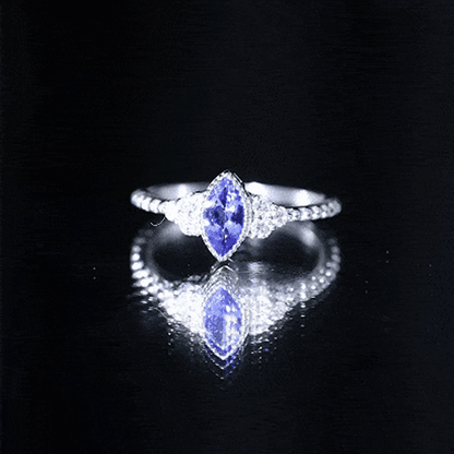 Vintage Style Marquise Tanzanite Promise Ring with Diamond Trio