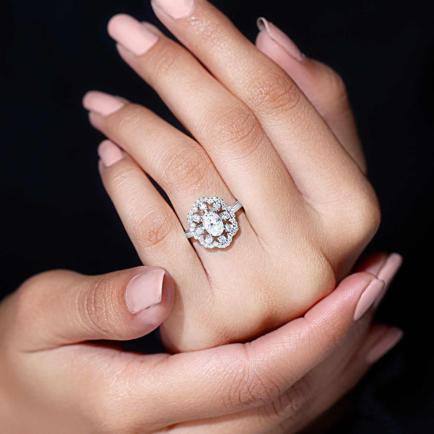 Oval Shaped Moissanite Flower Engagement Ring