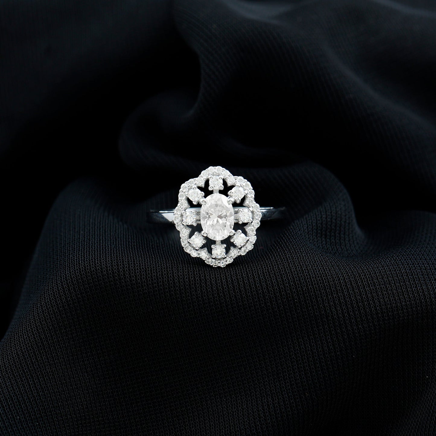 Oval Shaped Moissanite Flower Engagement Ring