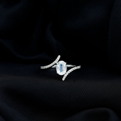 Oval Moonstone and Diamond Bypass Engagement Ring