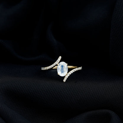 Oval Moonstone and Diamond Bypass Engagement Ring