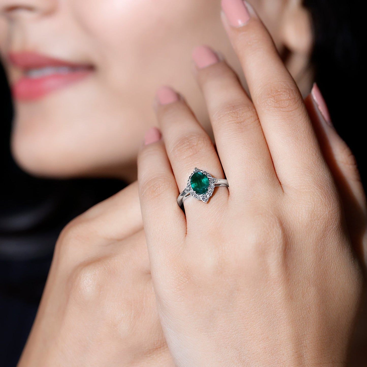 Vintage Looking Emerald Oval Engagement Ring with Diamond Halo